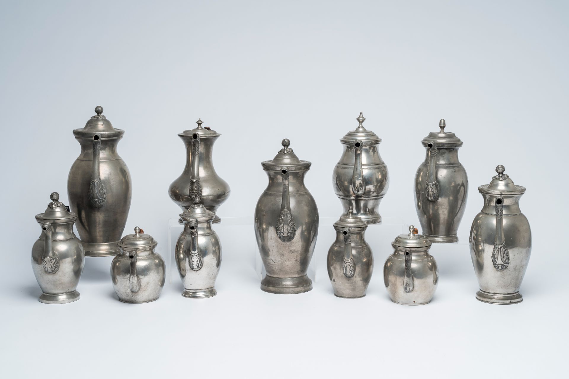 Eleven various pewter Empire 'dragon spout' jugs with wood handle, a.o. Brussels and Antwerp, 19th C - Image 2 of 9