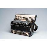 An Italian 'Super RonnÃ©a' chromatic accordion with piano keyboard, ca. 1960