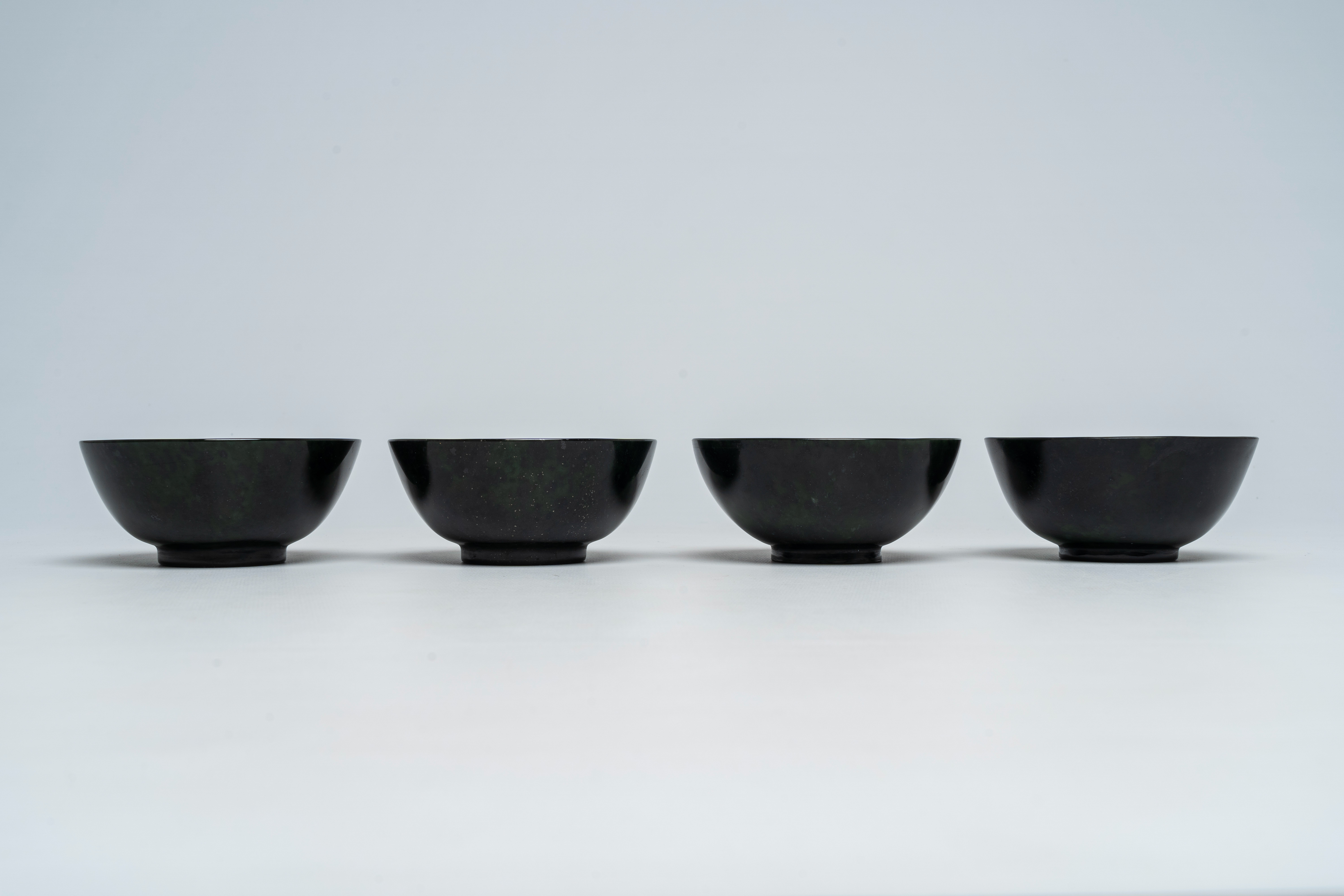 Four Chinese dark green jade bowls, 19th/20th C. - Image 5 of 8