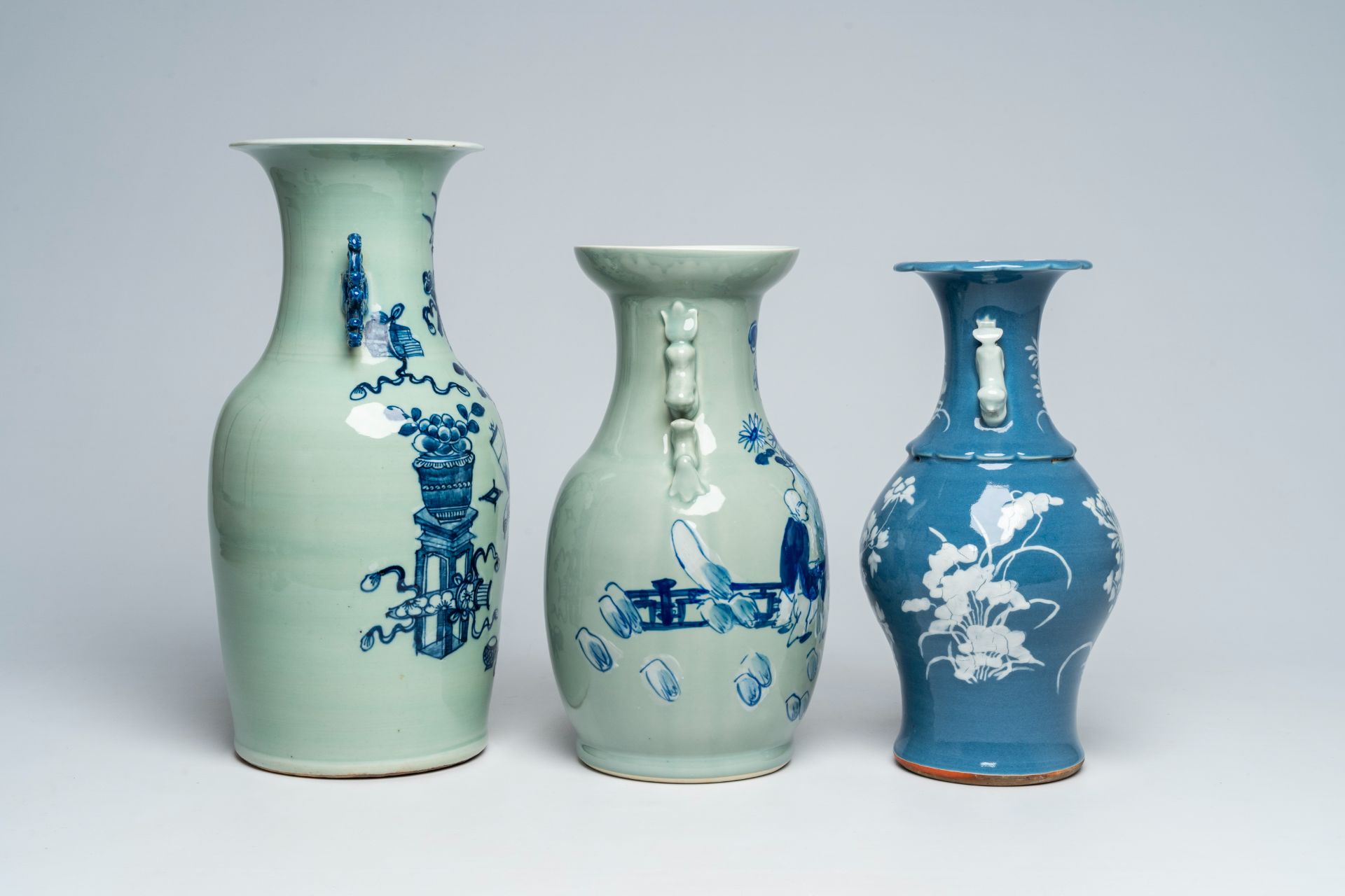 A Chinese slip-decorated blue ground vase with floral design and two blue and white celadon ground v - Image 4 of 6