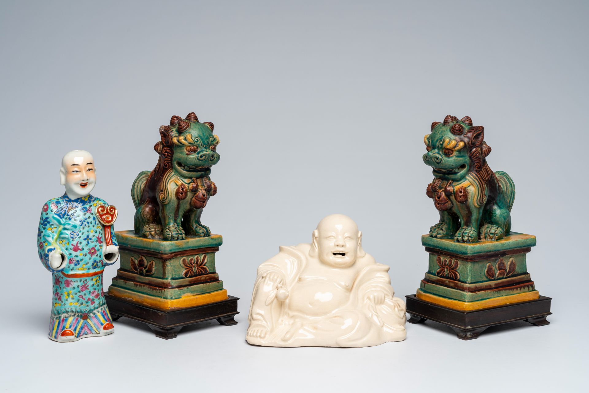 A Chinese blanc de Chine figure of Buddha, a pair of sancai glazed Buddhist lions and a famille rose - Image 10 of 10