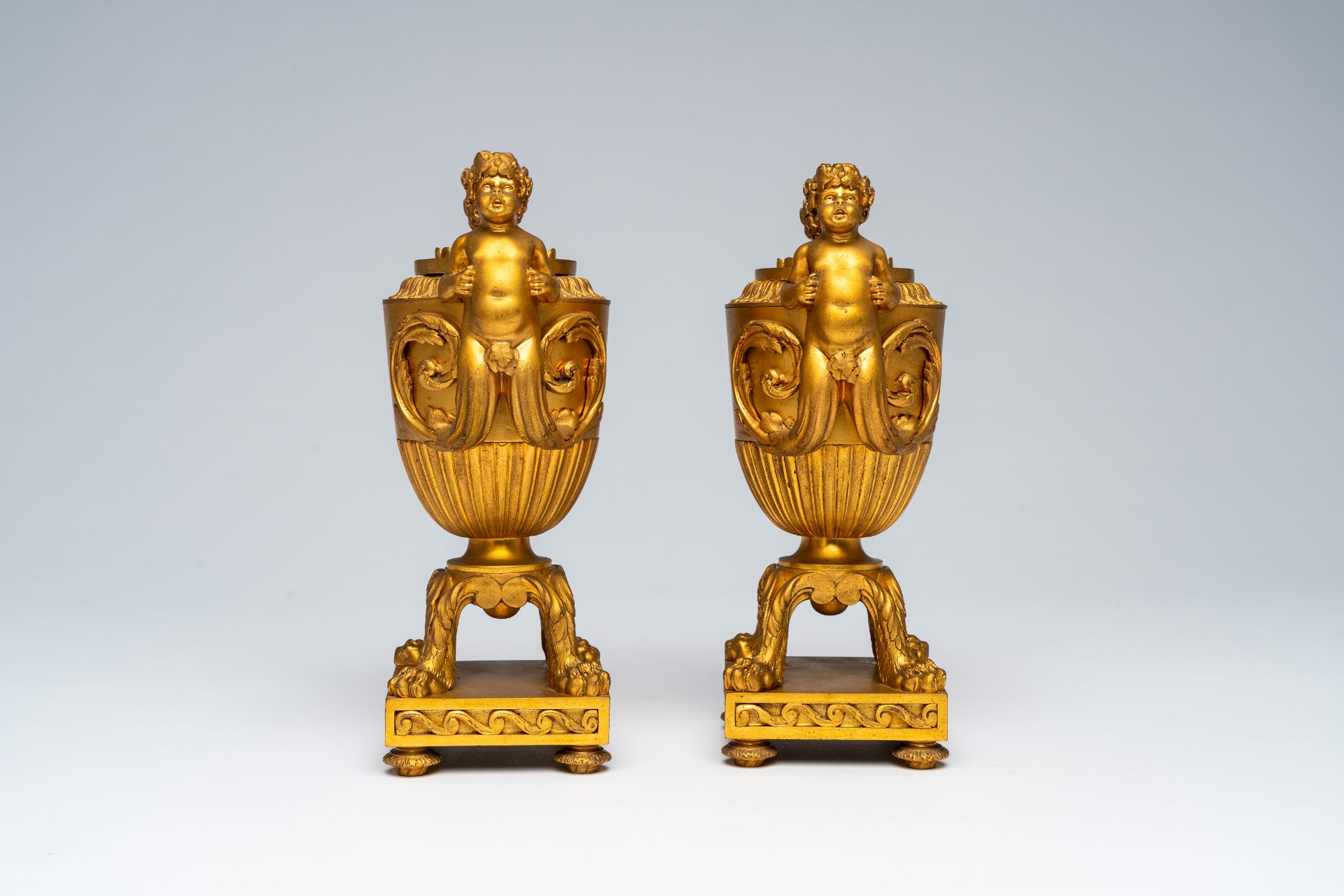 A pair of French gilt bronze vases and covers with bacchantes and lion's feet convertible into candl - Image 4 of 8