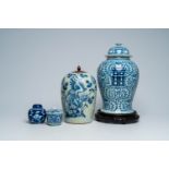 Four Chinese blue and white jars and vases and covers with floral design, Qianlong and later