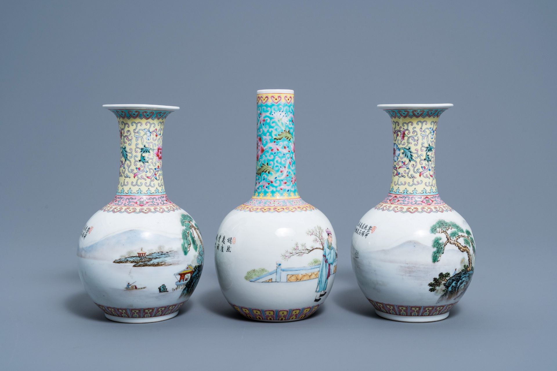 A pair of Chinese bottle shaped famille rose vases with an animated landscape and a vase with figura - Bild 3 aus 5
