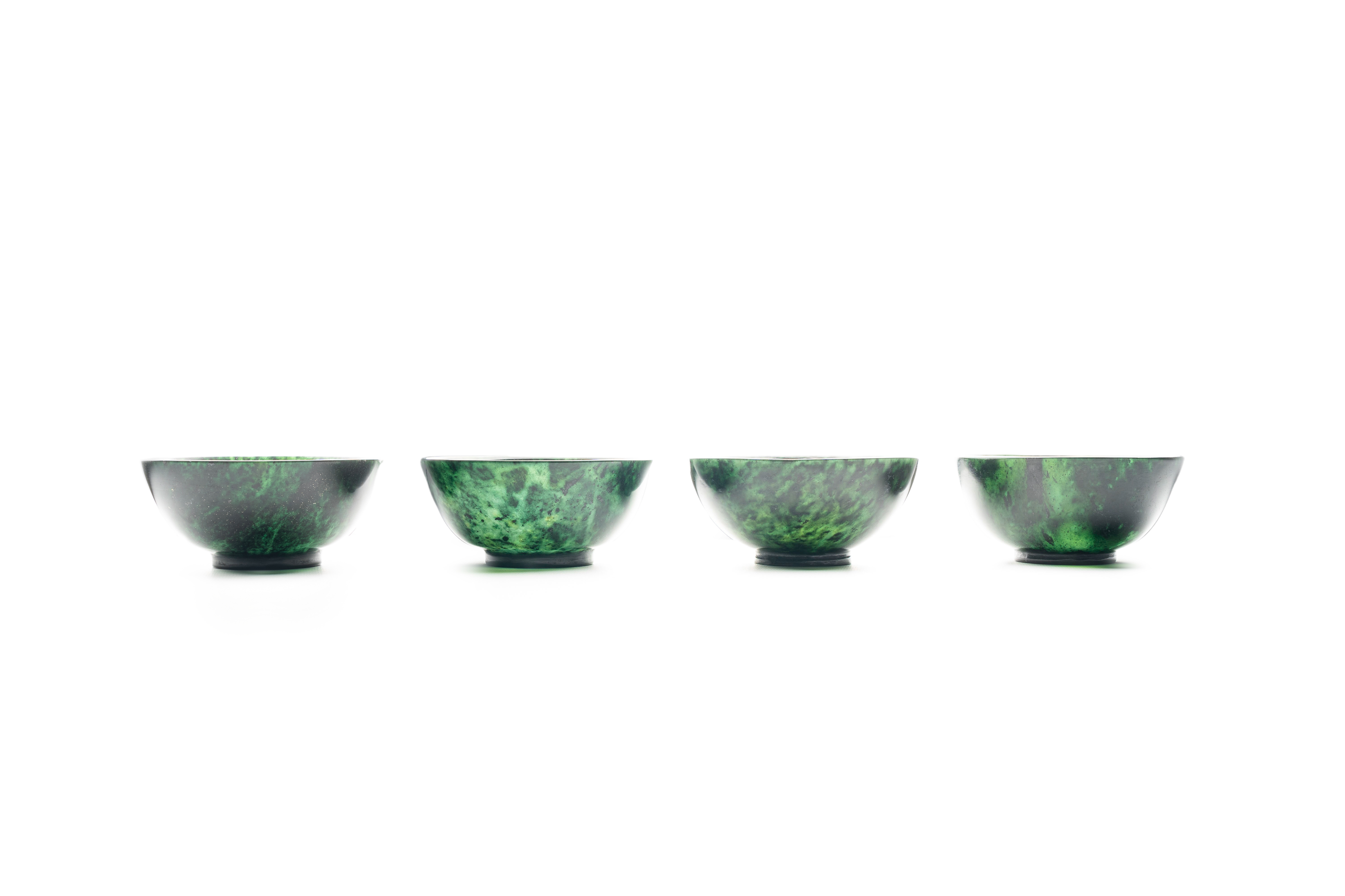 Four Chinese dark green jade bowls, 19th/20th C. - Image 8 of 8