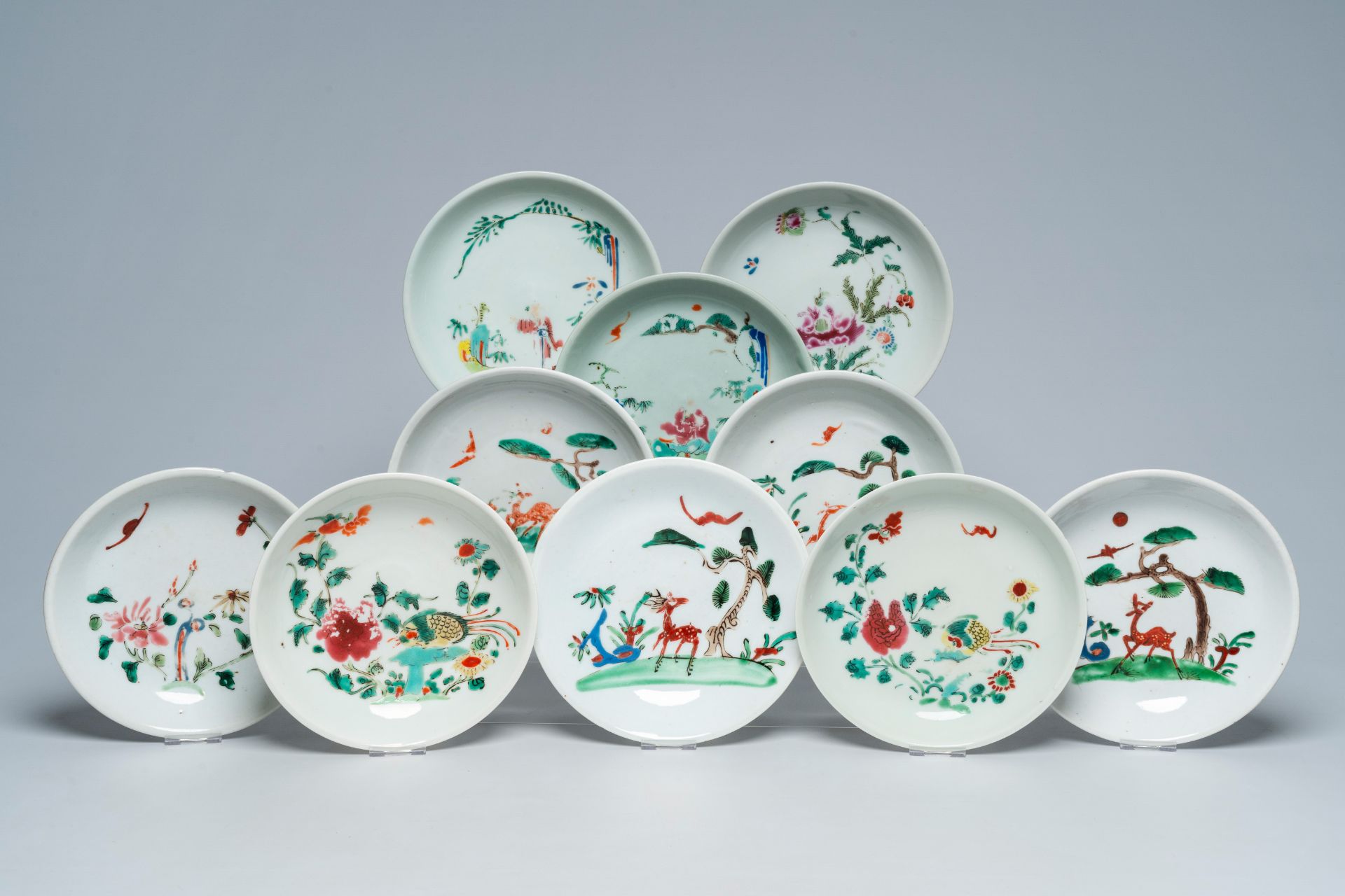 A Chinese famille rose vase after a Japanese example and ten famille rose dishes with animated scene - Image 9 of 17