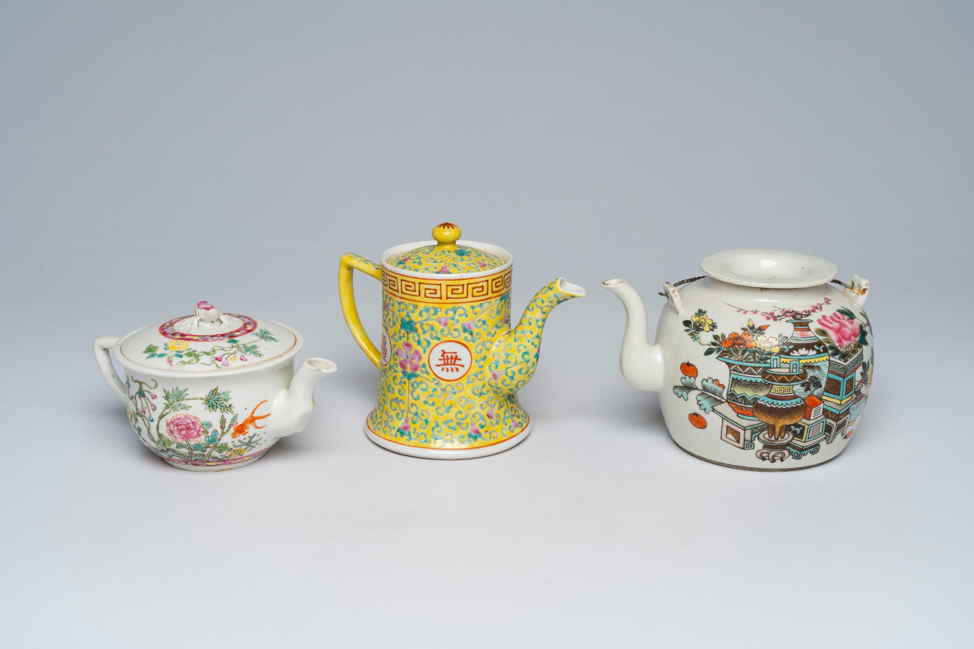 Three various Chinese famille rose and qianjiang cai teapots and covers, 19th/20th C.