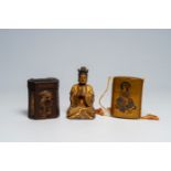 Two Japanese lacquered inro and a Chinese gilded wooden Buddha, 19th/20th C.