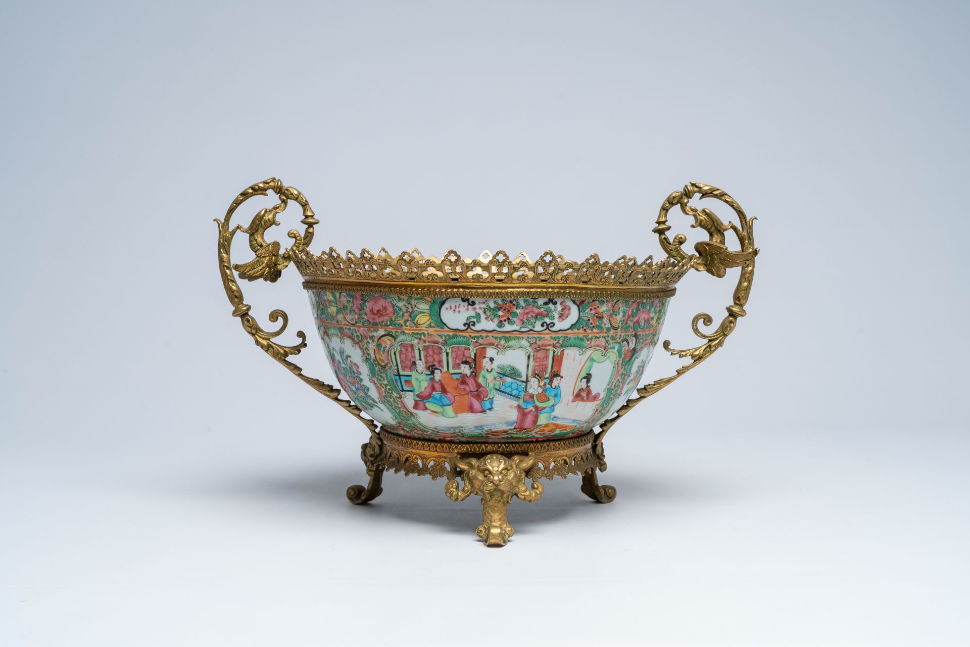 A Chinese Canton famille rose brass mounted bowl with palace scenes and floral design, 19th C. - Image 4 of 7