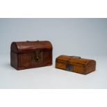 Two leather-upholstered wood coffers, 19th/20th C.