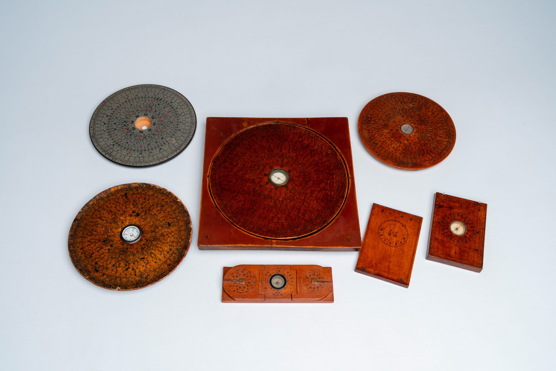 Six various Chinese Feng Shui compasses, a bamboo cricket box and an abacus, 19th/20th C. - Image 2 of 5