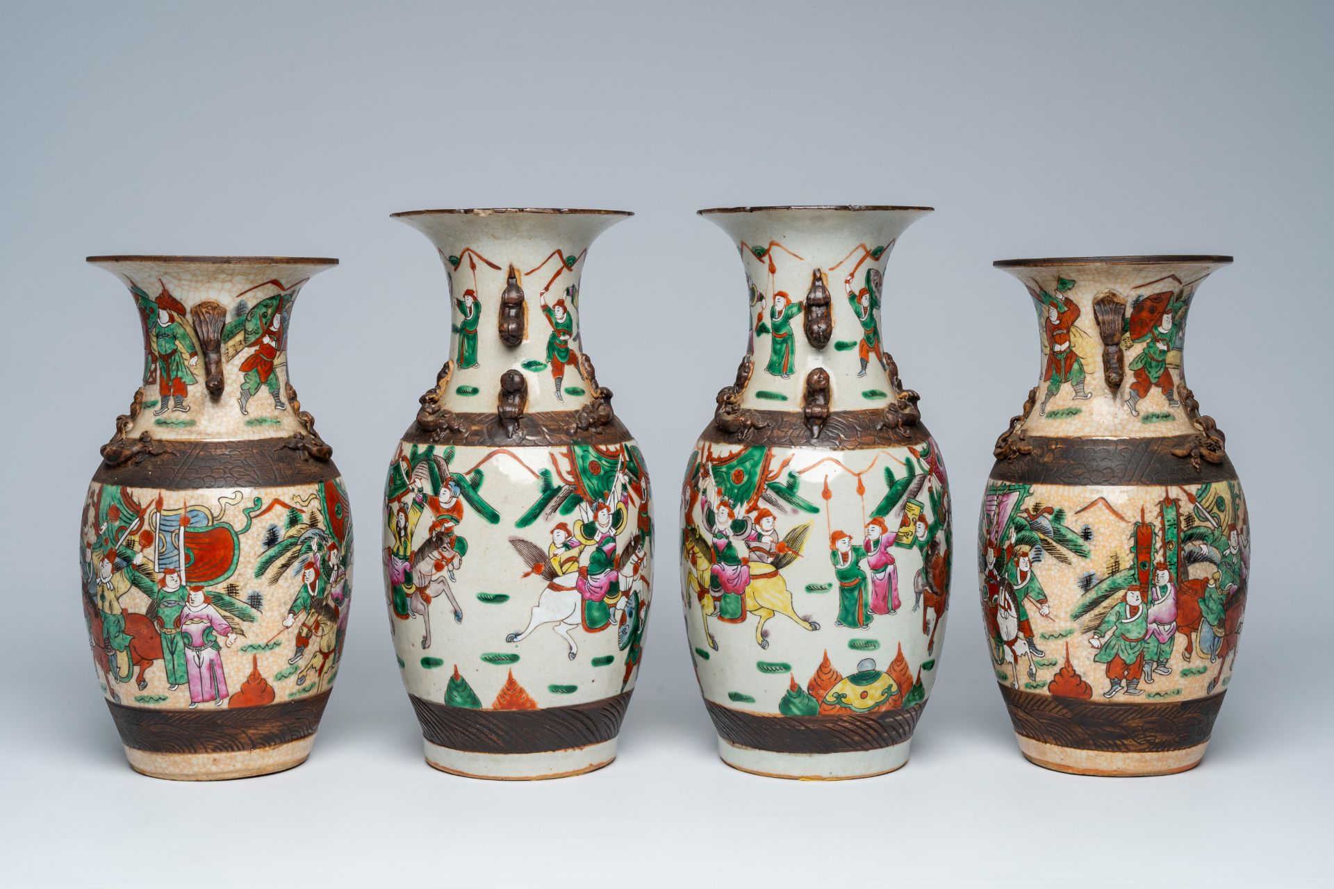 Two pairs of Chinese Nanking crackle glazed famille rose 'warrior' vases, 19th C. - Image 5 of 7