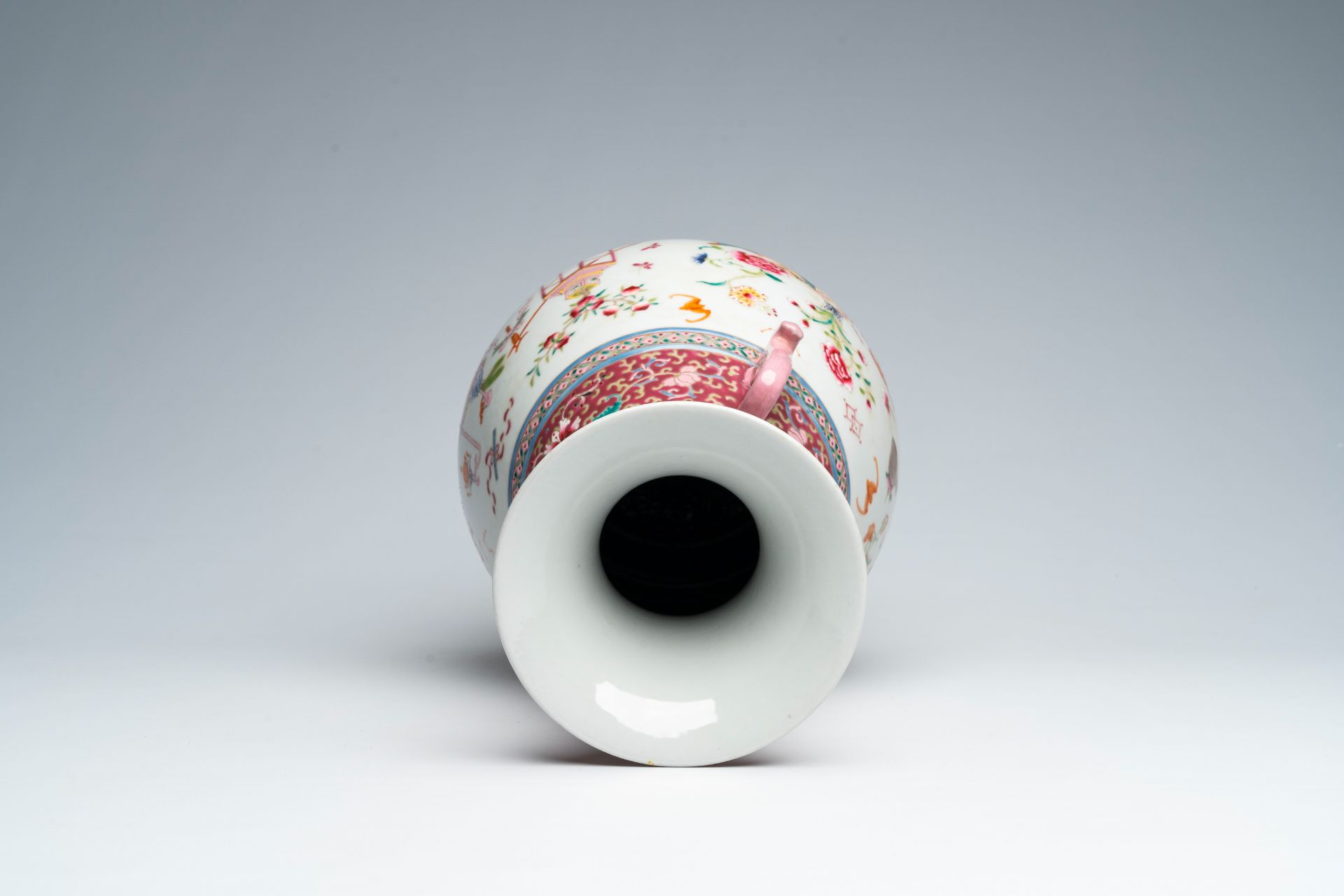 A Chinese famille rose 'yuhuchunping' vase with antiquities design, Qianlong mark, 19th C. - Image 6 of 7