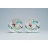 A pair of Chinese famille rose 'lady on a swing' saucers, Yongzheng