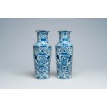 A pair of Chinese blue and white vases with boys and antiquities, Kangxi mark, 19th C.