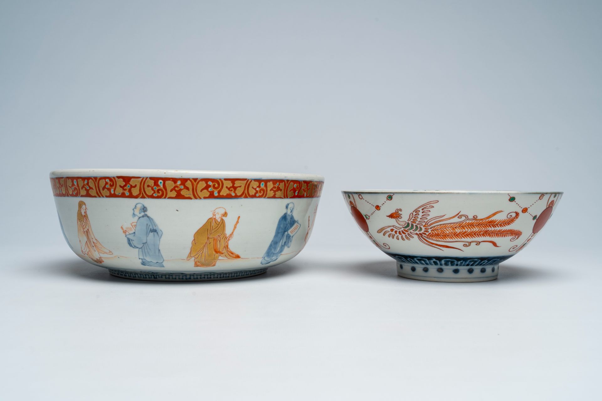 A Japanese Imari 'sages' bowl and a bowl with sailing ships and phoenixes, Meiji, 19th C. - Image 5 of 7