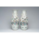 A pair of Chinese famille rose vases with ladies in a garden, 19th/20th C.