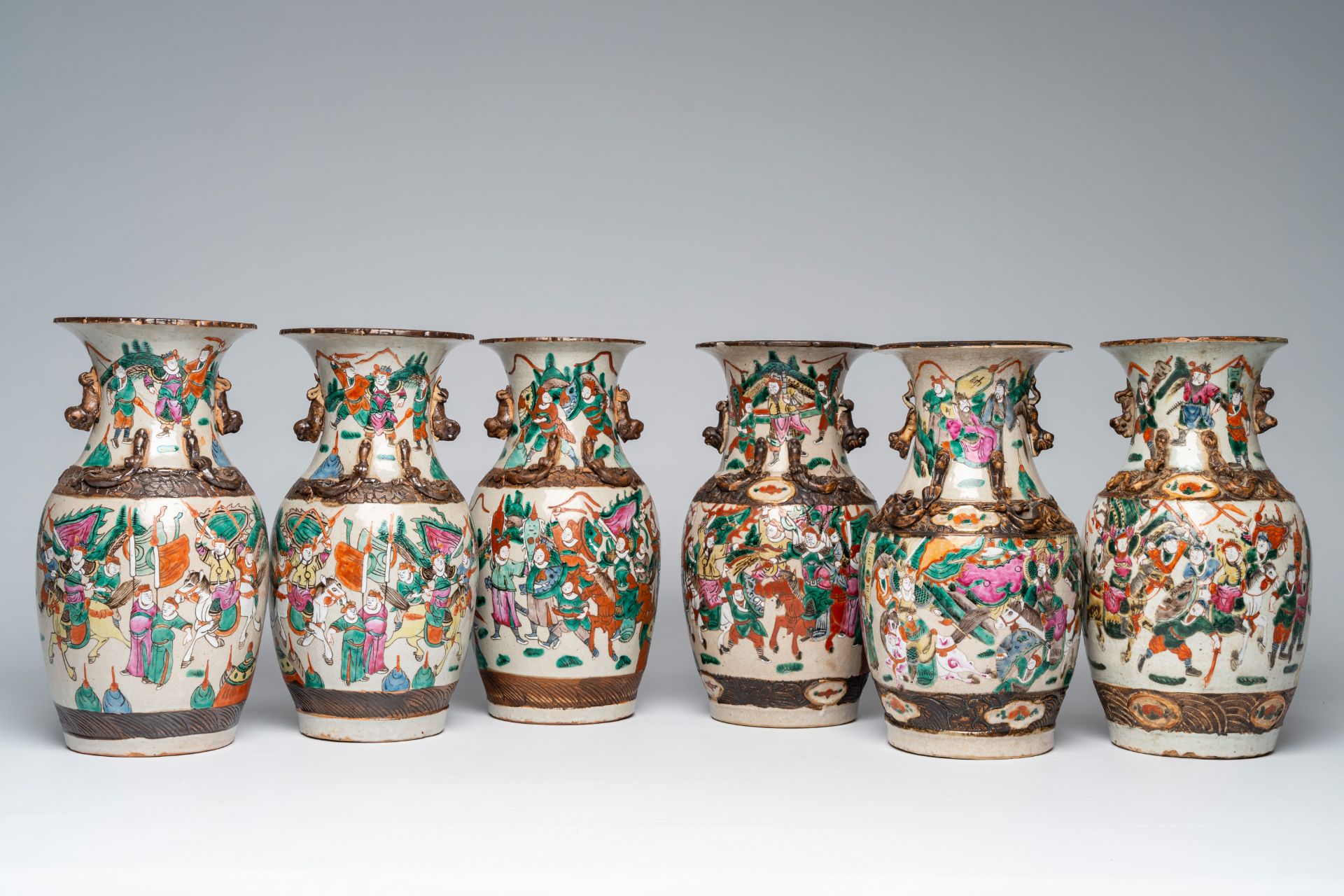Six various Chinese Nanking crackle glazed famille rose 'warrior' vases, 19th/20th C.