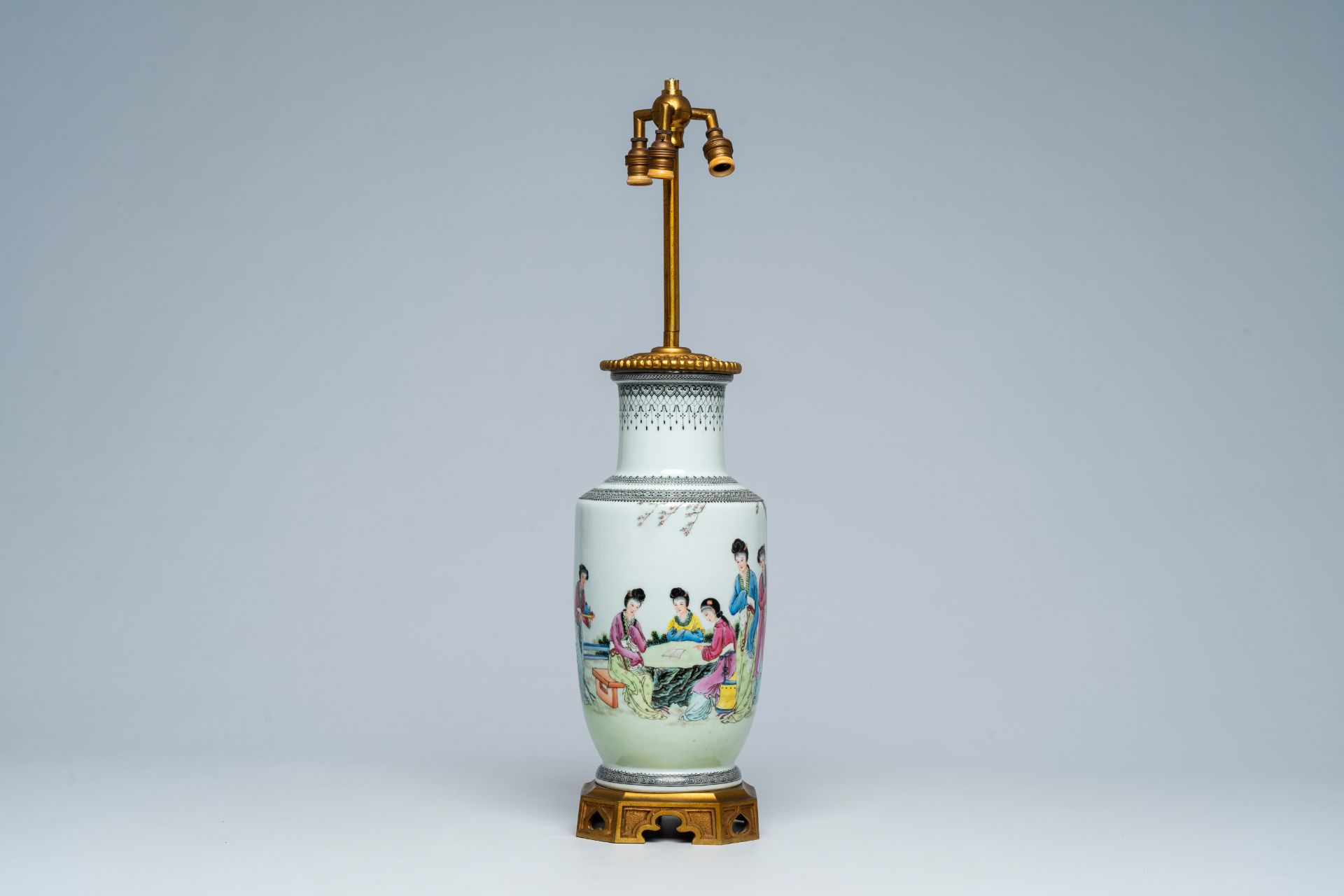 A Chinese famille rose vase with ladies in a garden mounted as a lamp, Republic, 20th C.