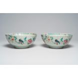 A pair of Chinese famille rose bowls with birds among blossoming branches, Qianlong