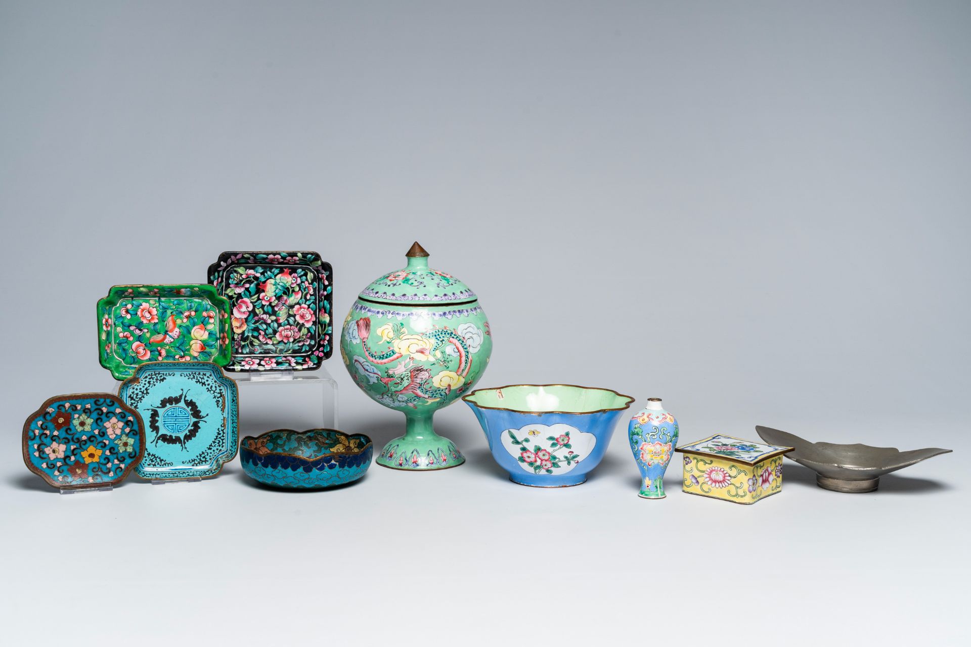 A varied collection of Chinese cloisonnÃ© items and a pewter saucer, 20th C.