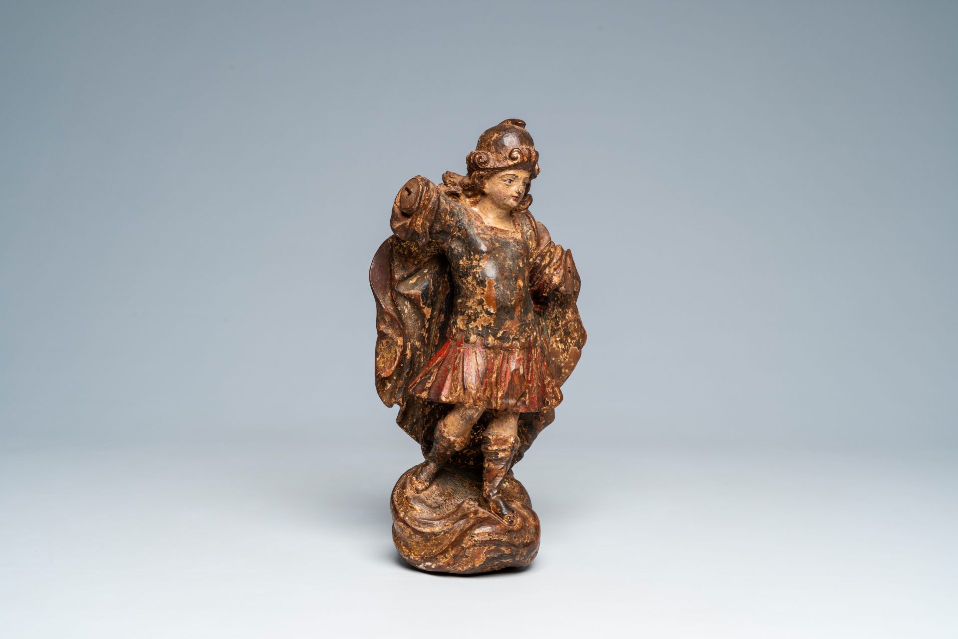 An Italian carved, polychrome painted and gilt wood archangel Michael, 17th C. - Image 8 of 8