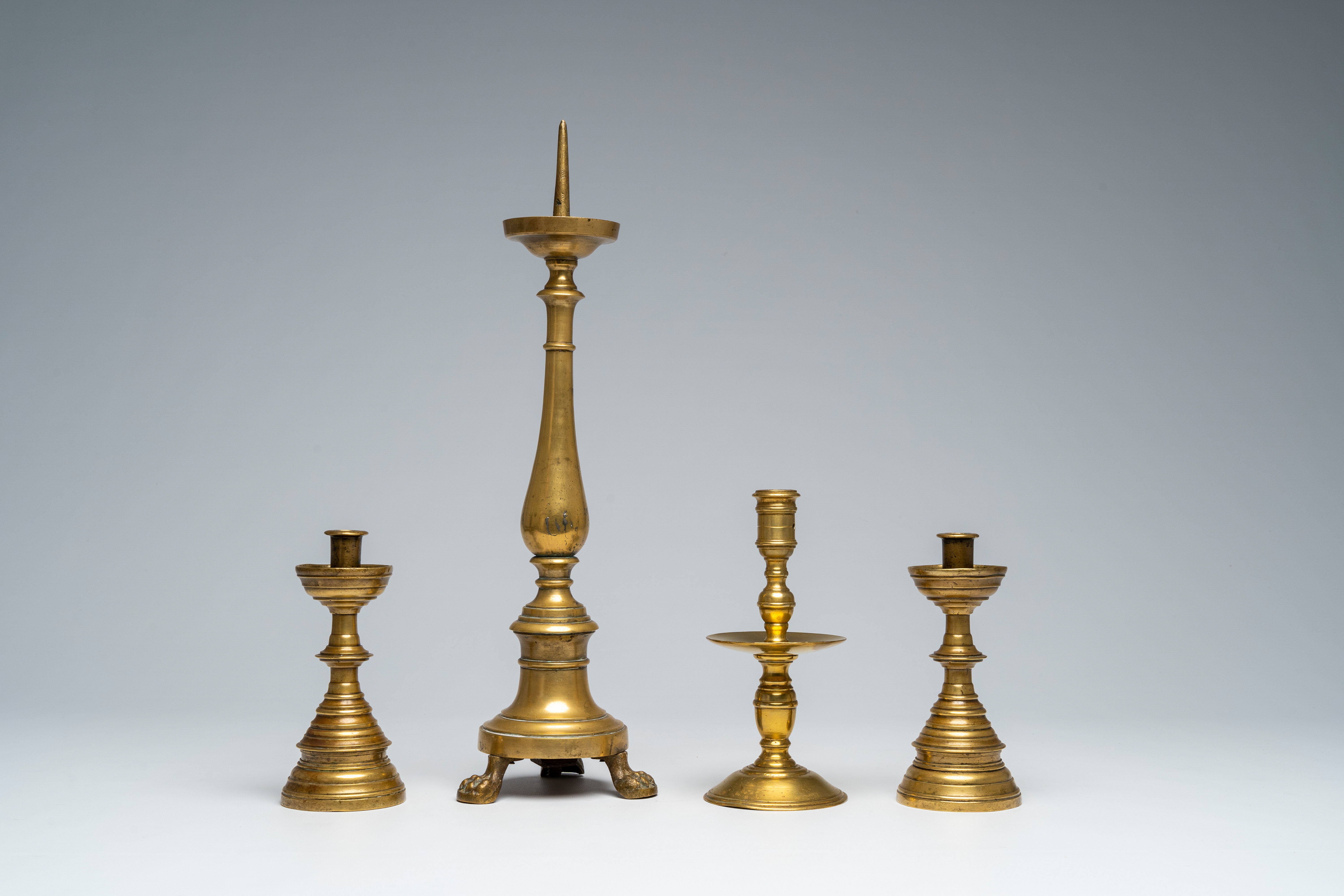 Four various bronze and brass candlesticks, 17th C. and later - Image 5 of 7