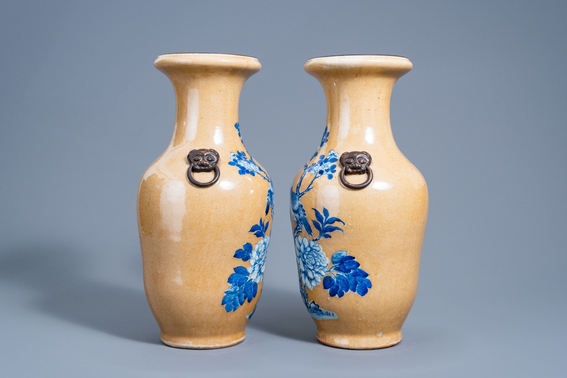 A pair of Chinese Nanking crackle glazed blue and white 'cafÃ© au lait' ground vases with a bird on - Image 3 of 5