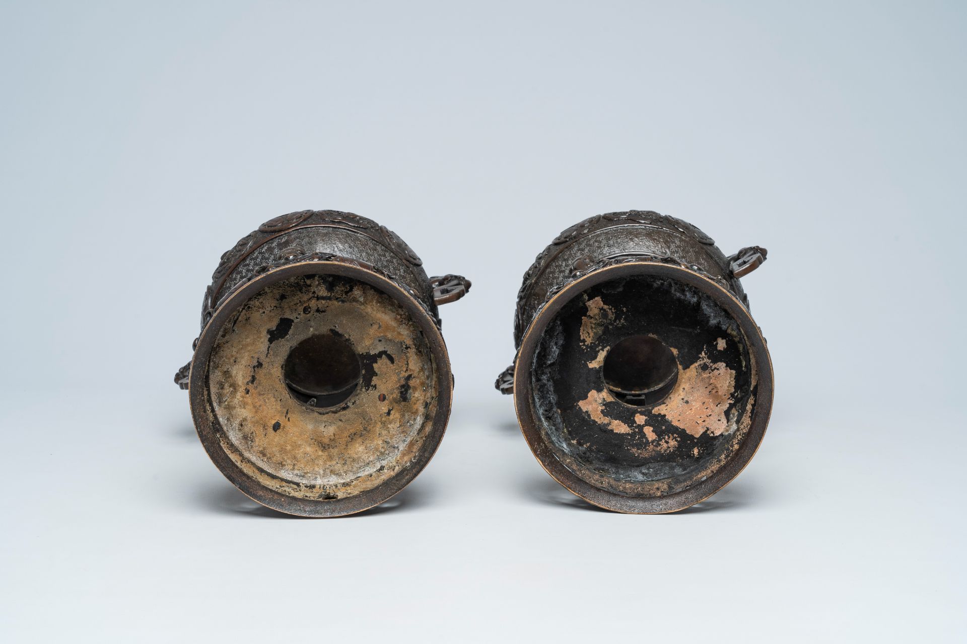 A pair of Japanese bronze vases with Tokugawa medallions in relief, Meiji, 19th C. - Image 7 of 7