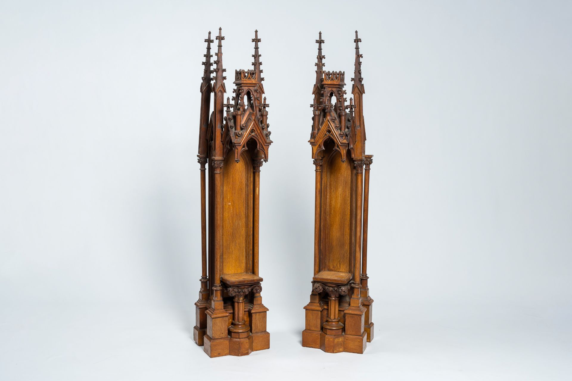 A pair of French Gothic revival oak sculpture niches, late 19th C.