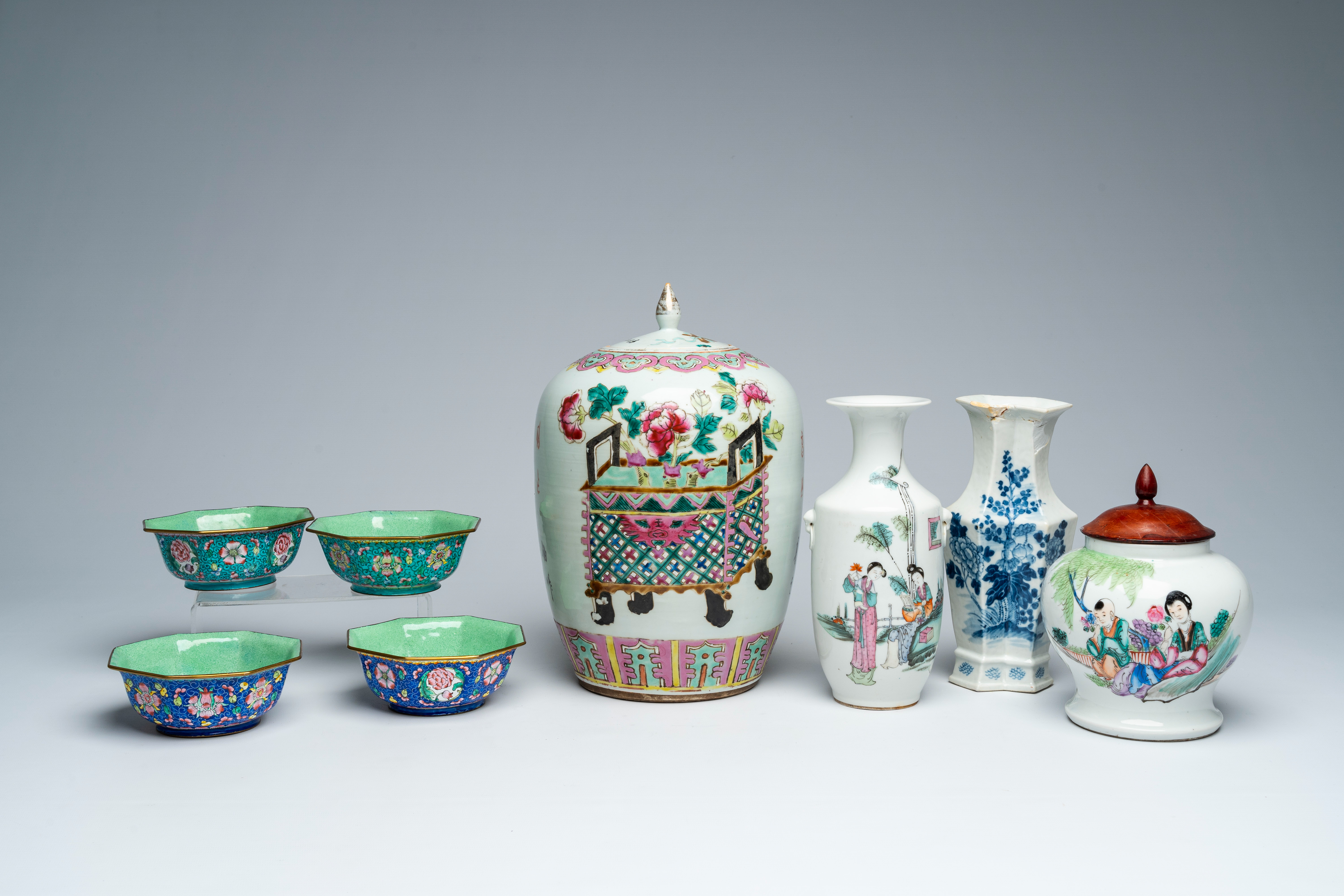 Four Chinese blue, white, famille rose and qianjiang cai vases and jars and covers and four Canton e