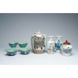 Four Chinese blue, white, famille rose and qianjiang cai vases and jars and covers and four Canton e