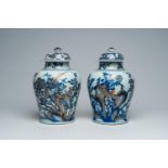 Two Chinese Imari style vases and covers with pheasants among blossoming branches, Kangxi