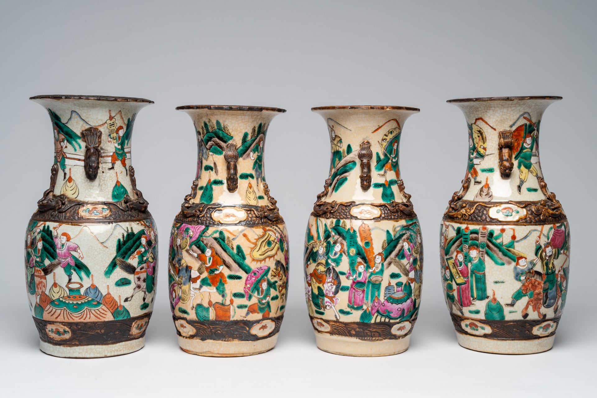 Four Chinese Nanking crackle glazed famille rose vases with warrior scenes, 19th C. - Image 3 of 7