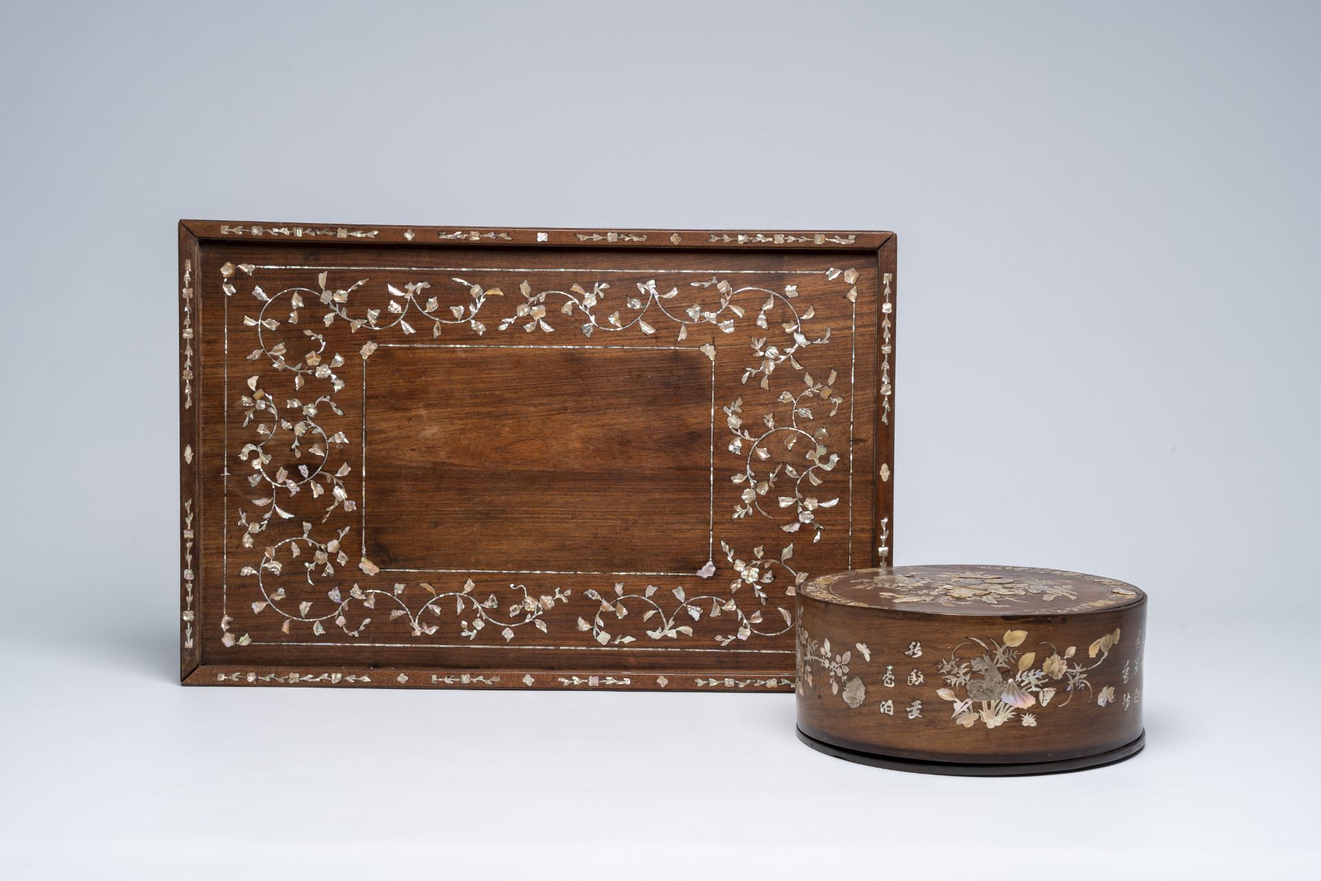 A large Chinese mother of pearl-inlaid wooden tray and a box and cover, 19th/20th C.