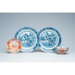 A pair of Chinese blue and white plates with birds among blossoming branches, an Amsterdams bont bow