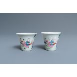 A pair of Chinese famille rose 'playing boys' wine cups, Qianlong mark, Republic, 20th C.