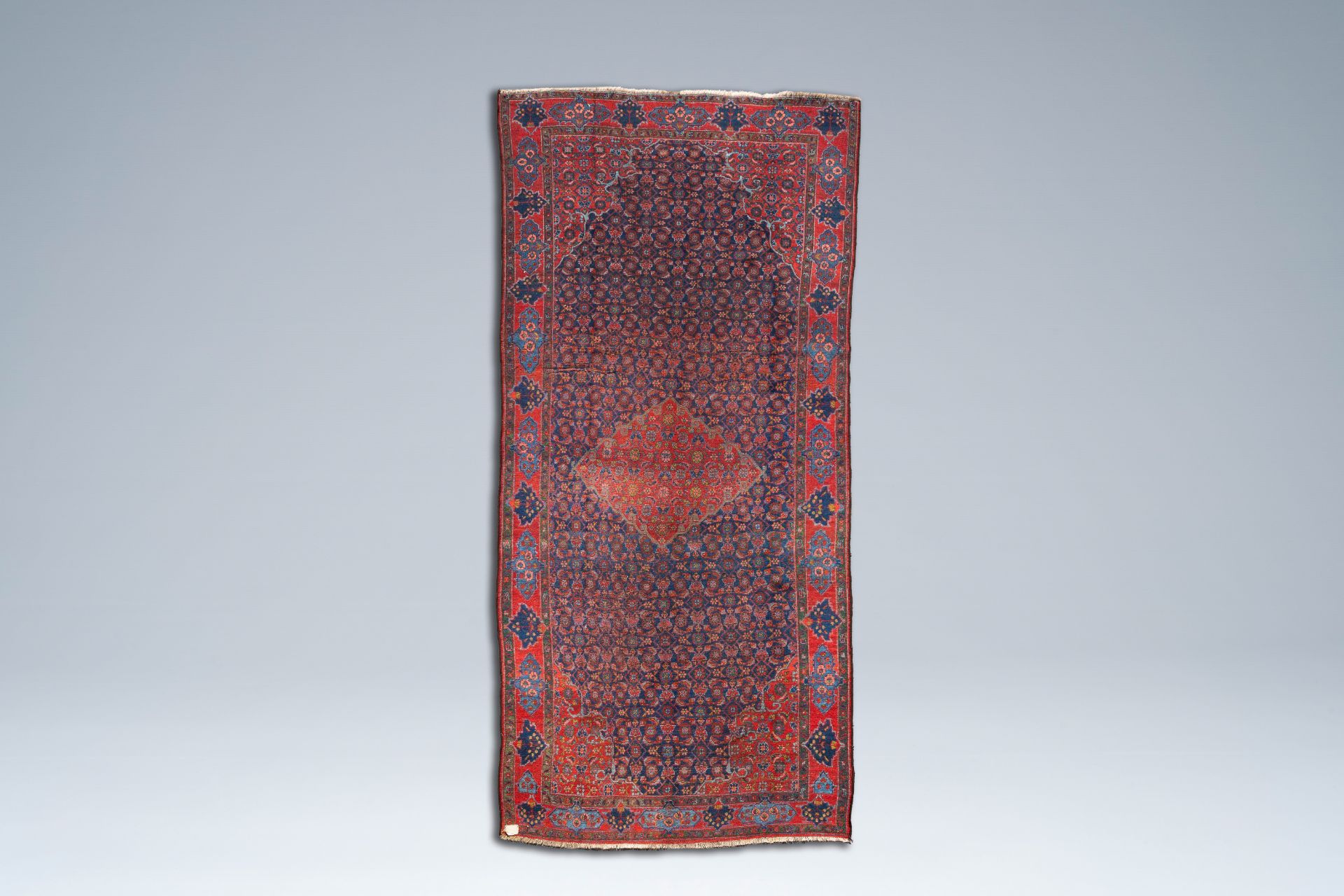 An Oriental Bidjar rug with floral design, wool on cotton, 20th C. - Image 3 of 3
