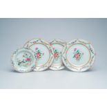 Three Chinese famille rose chargers with floral design and a 'peacock' plate, Qianlong