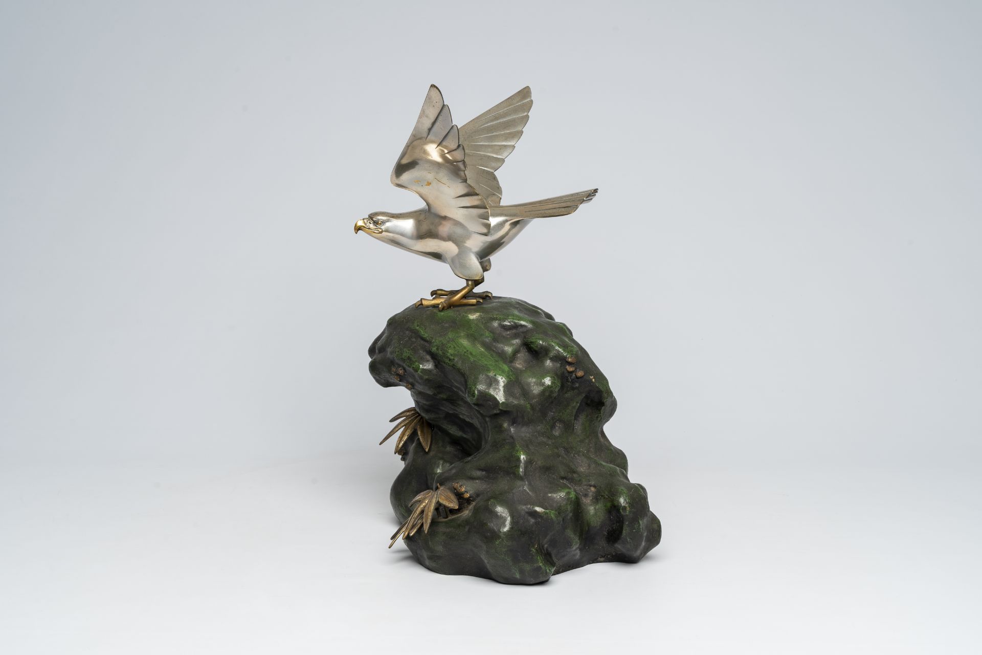 A Japanese patinated and silver-plated metal okimono of an eagle on a rock, signed Hidemasa, 20th C. - Image 3 of 17