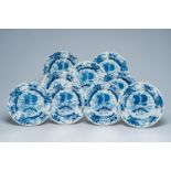 Nine Chinese blue and white plates with a bird among blossoming branches, 19th C.