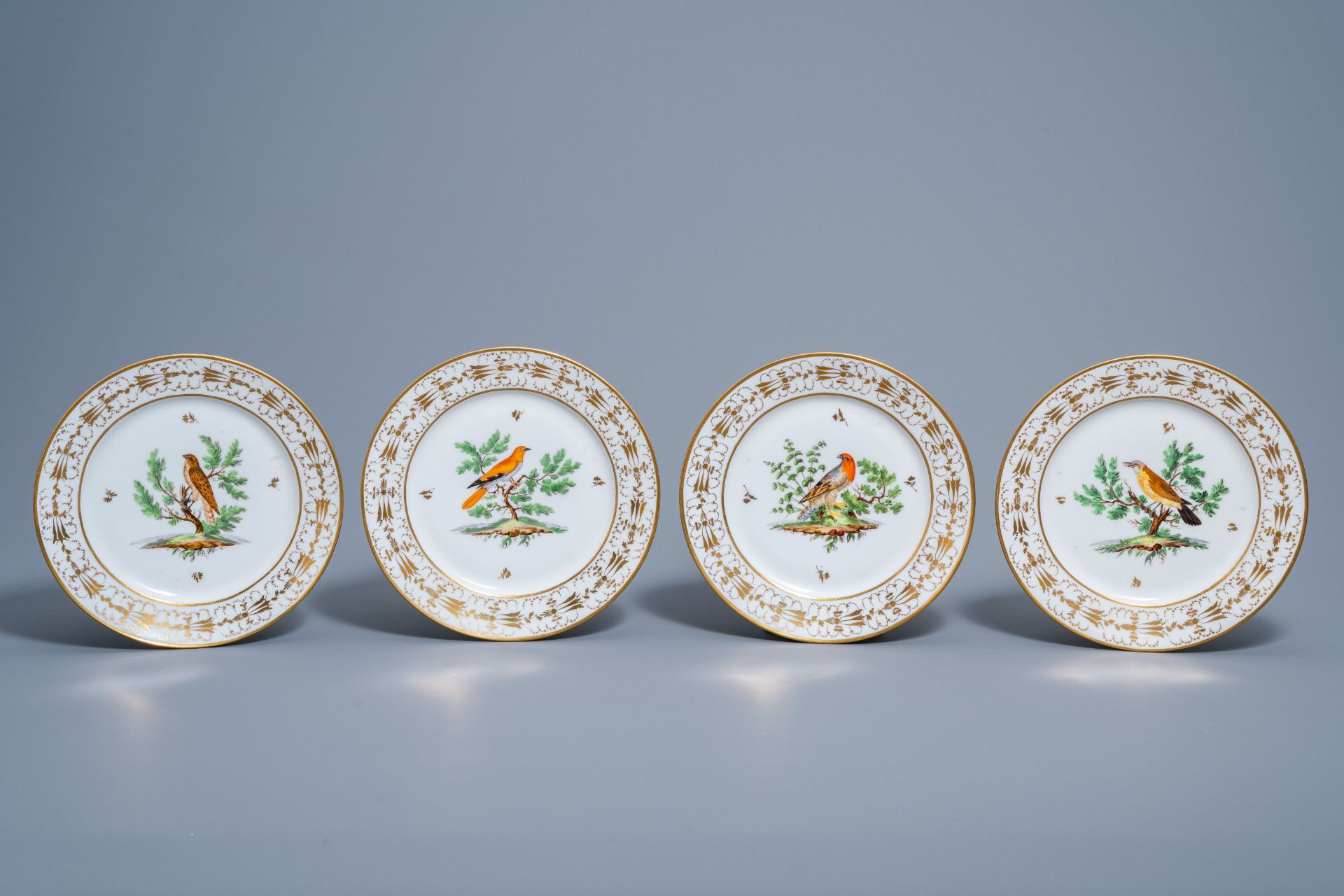 A set of eleven French plates and one oval charger with gilt and polychrome exotic birds design, fir - Image 2 of 9