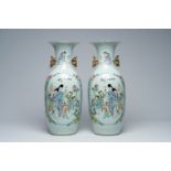 A pair of Chinese famille rose vases with court ladies and playing children, 19th/20th C.