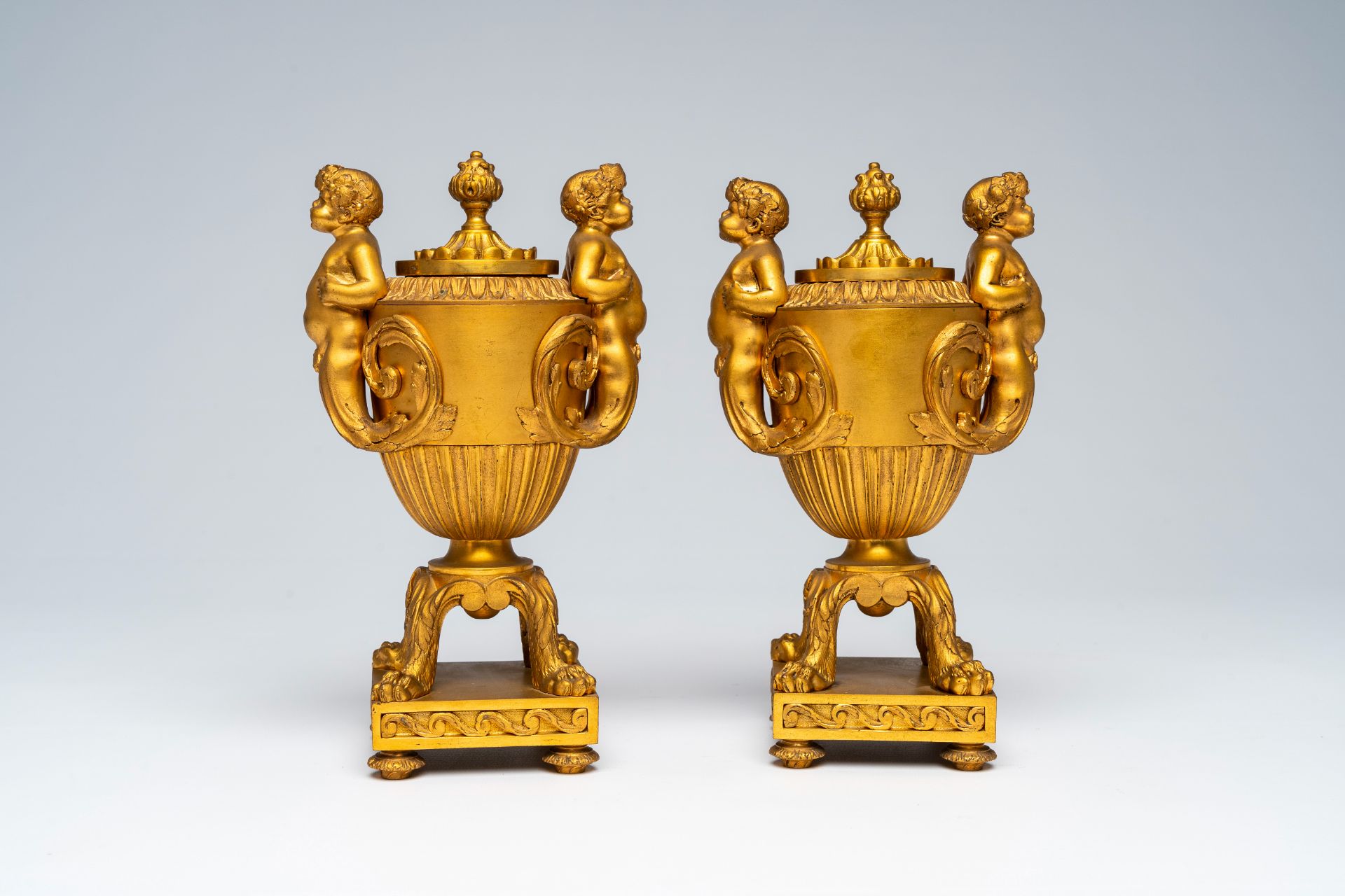 A pair of French gilt bronze vases and covers with bacchantes and lion's feet convertible into candl - Image 2 of 8