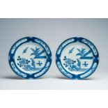 A pair of Chinese blue and white 'Cuckoo in the house' chargers, Qianlong