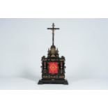 An impressive German Baroque brass mounted ebonised wood reliquary, 18th C.