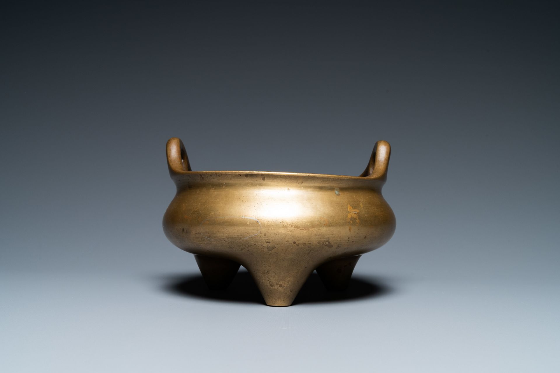 A Chinese bronze tripod censer, Xuande mark, 19th C. - Image 2 of 7