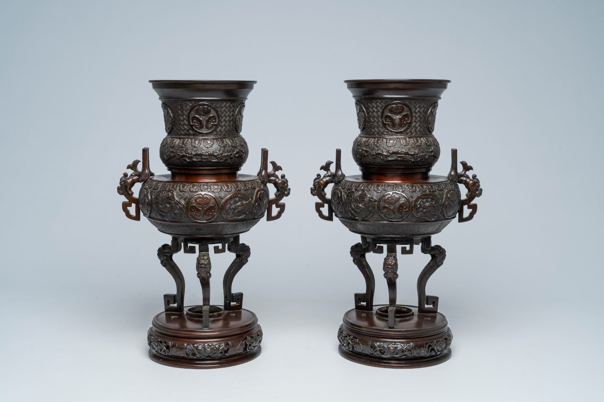 A pair of Japanese bronze vases with Tokugawa medallions in relief, Meiji, 19th C. - Image 2 of 7