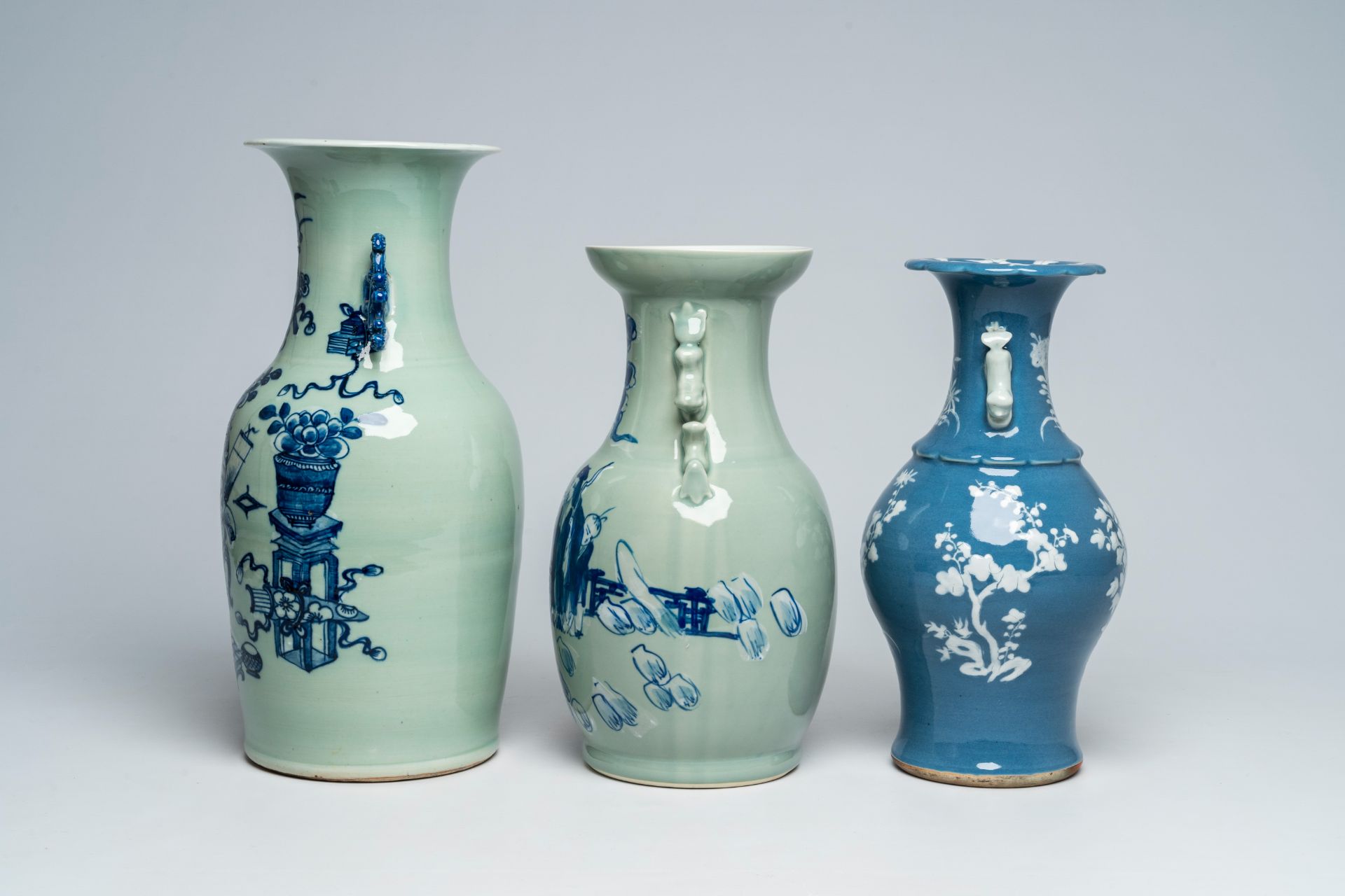 A Chinese slip-decorated blue ground vase with floral design and two blue and white celadon ground v - Image 2 of 6