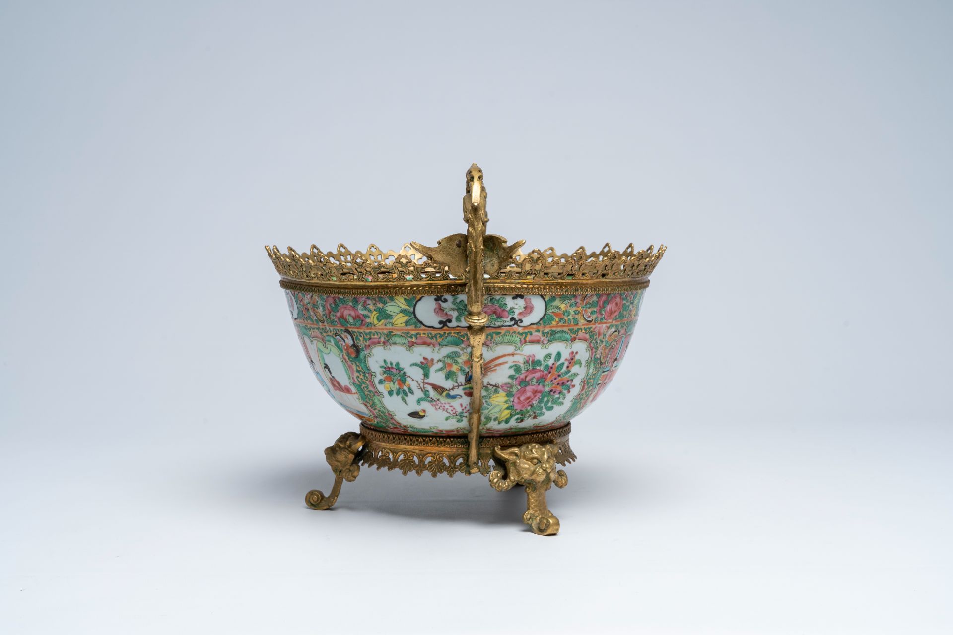 A Chinese Canton famille rose brass mounted bowl with palace scenes and floral design, 19th C. - Image 5 of 7